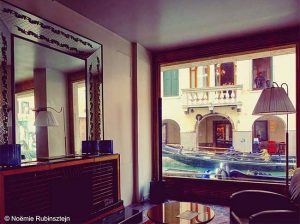 Picture of Hotel Bauer in Venice featuring a lobby with a window on palaces and a passing gondola.